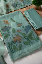 Load image into Gallery viewer, Trendy Tales Teal Cotton Unstitched Suit Set