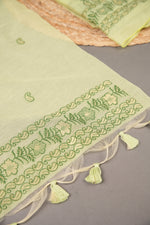 Load image into Gallery viewer, Floral Silhouettes Green Muga Cotton Unstitched Suit Set