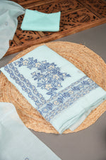Load image into Gallery viewer, Floral Silhouettes Sky Blue Muga Cotton Unstitched Suit Set