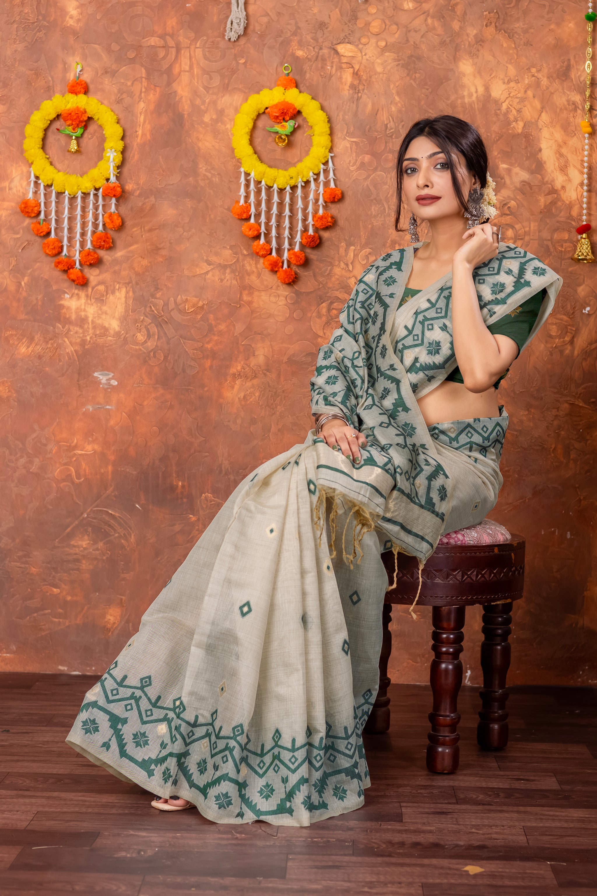 Parnita Beige & Bottle Green Muga Cotton Jamdani Saree