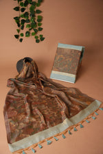Load image into Gallery viewer, Serene Silhouettes Blue Muga Cotton Woven Senery Unstitched Suit Set
